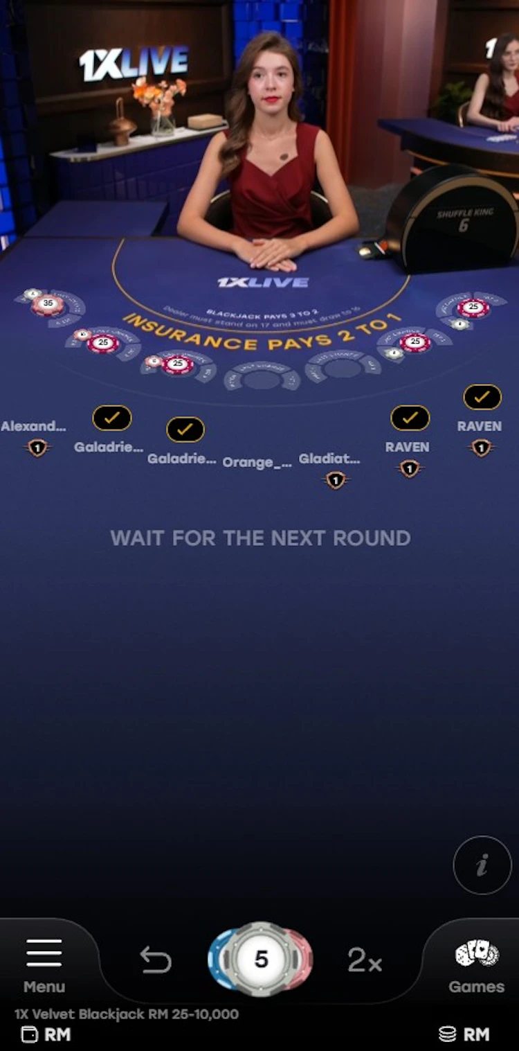 Live blackjack table showing RM 25 to 10,000 limits in the casino lobby